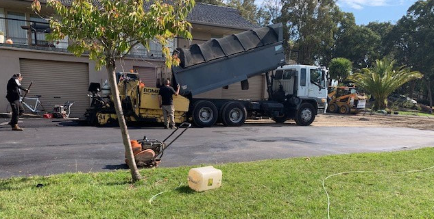 This is a photo of an asphalt driveway which is in the process of being installed by Toowoomba Asphalt & Bitumen Surfacing